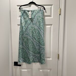 New with tag green midi slip skirt. With side zipper